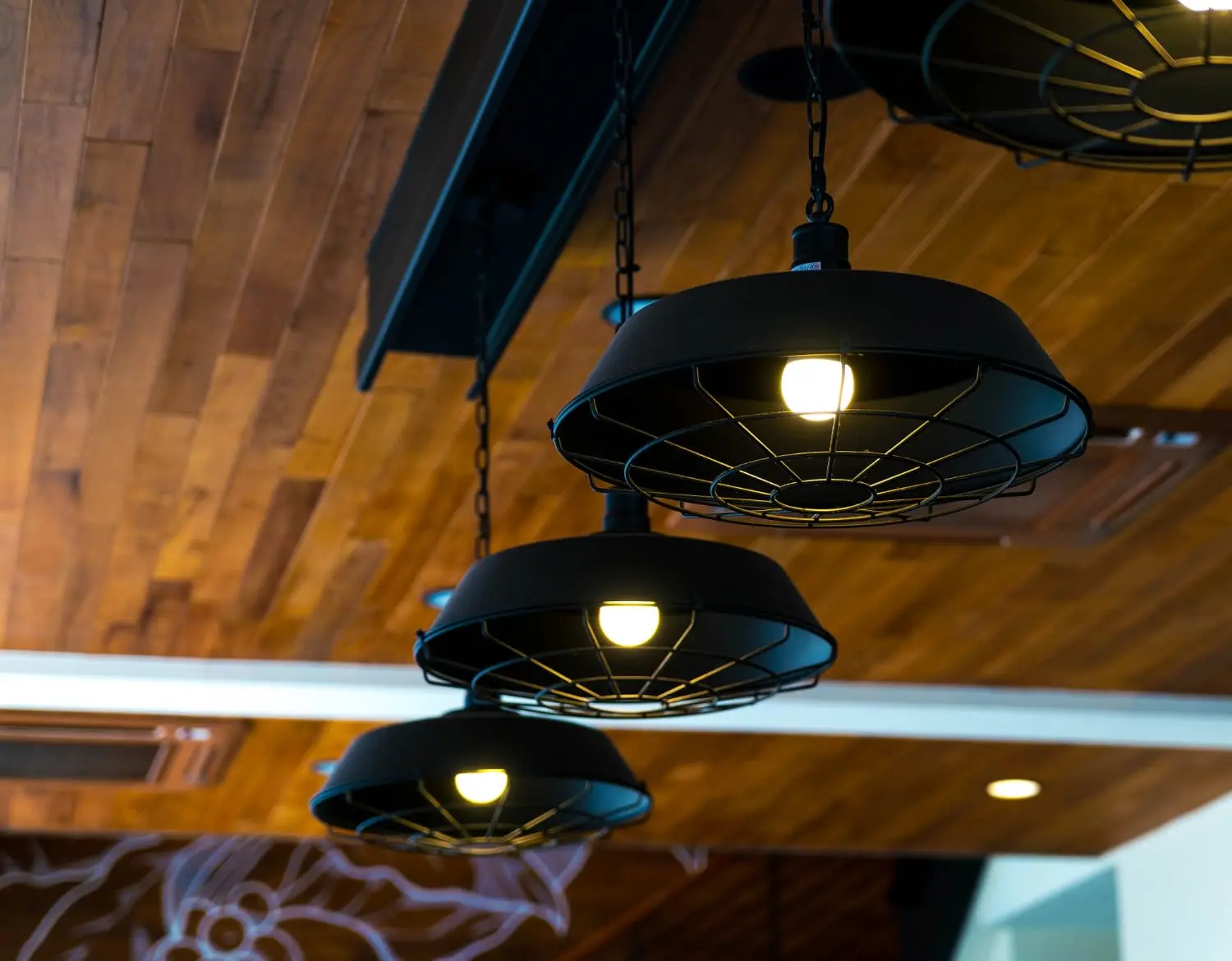 Three modern pendant light fixtures hanging from the ceiling - Types of Ceiling Lights: Get the Right Choice for Your Home - Vorlane - Vorlane