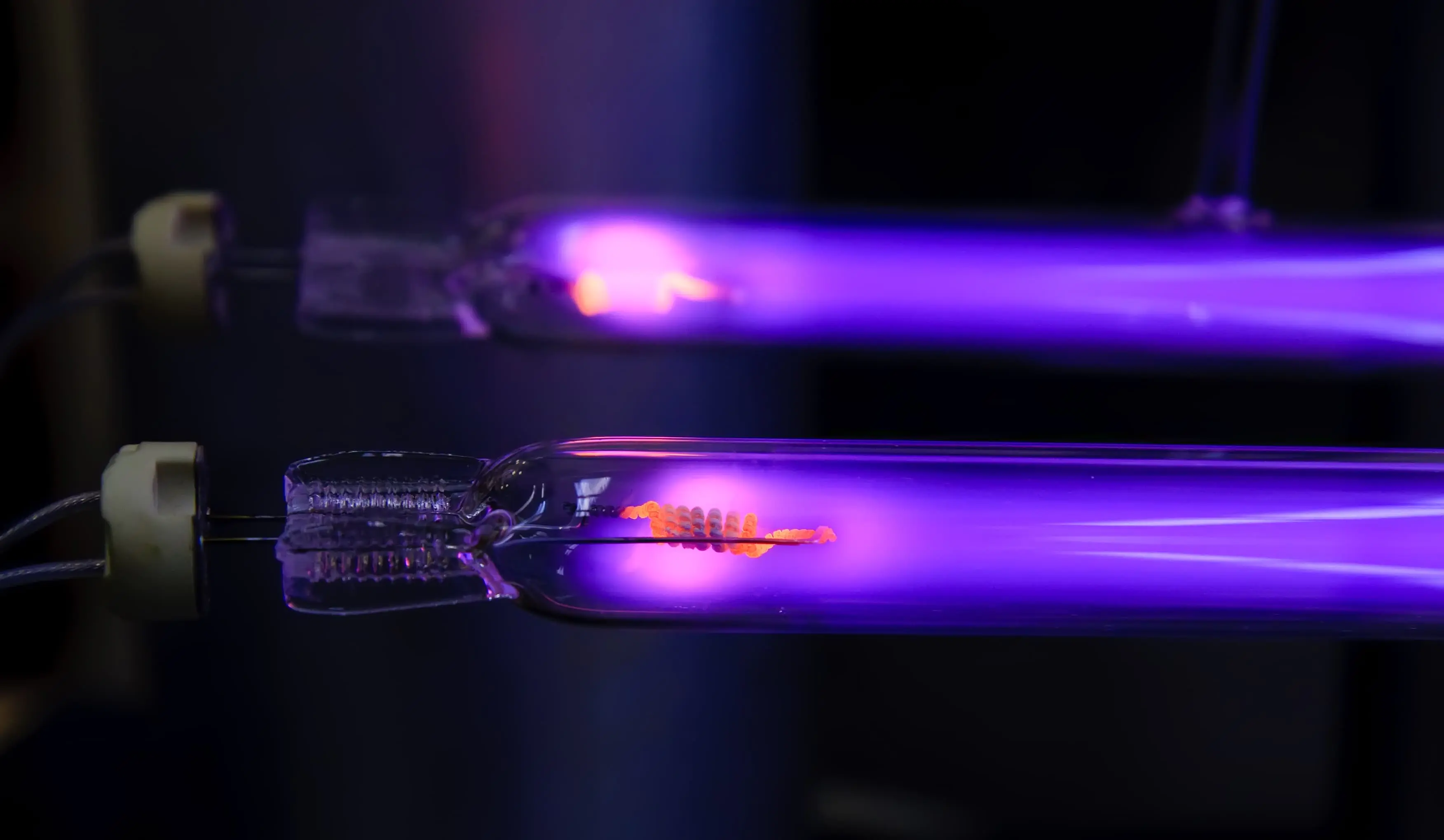 Vivid ultraviolet tubes showcasing different types of UV lighting and their applications - Ultra Violet Lights: Types and Applications - Vorlane - Vorlane